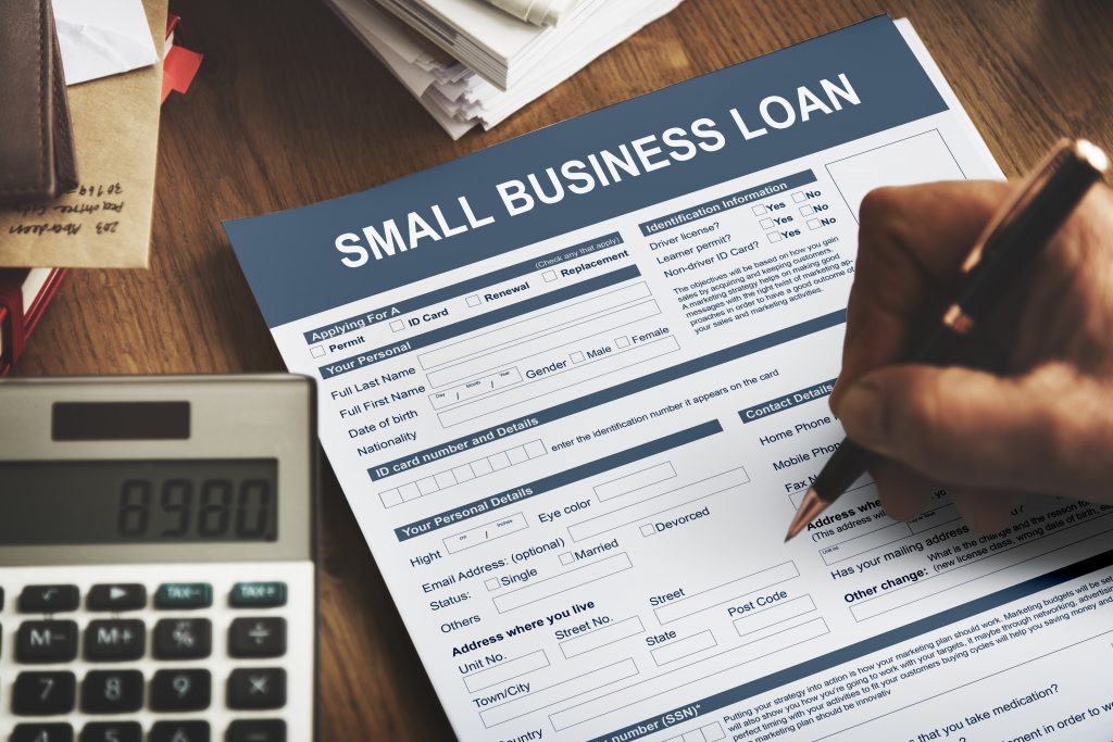 Filling out a small business loan.