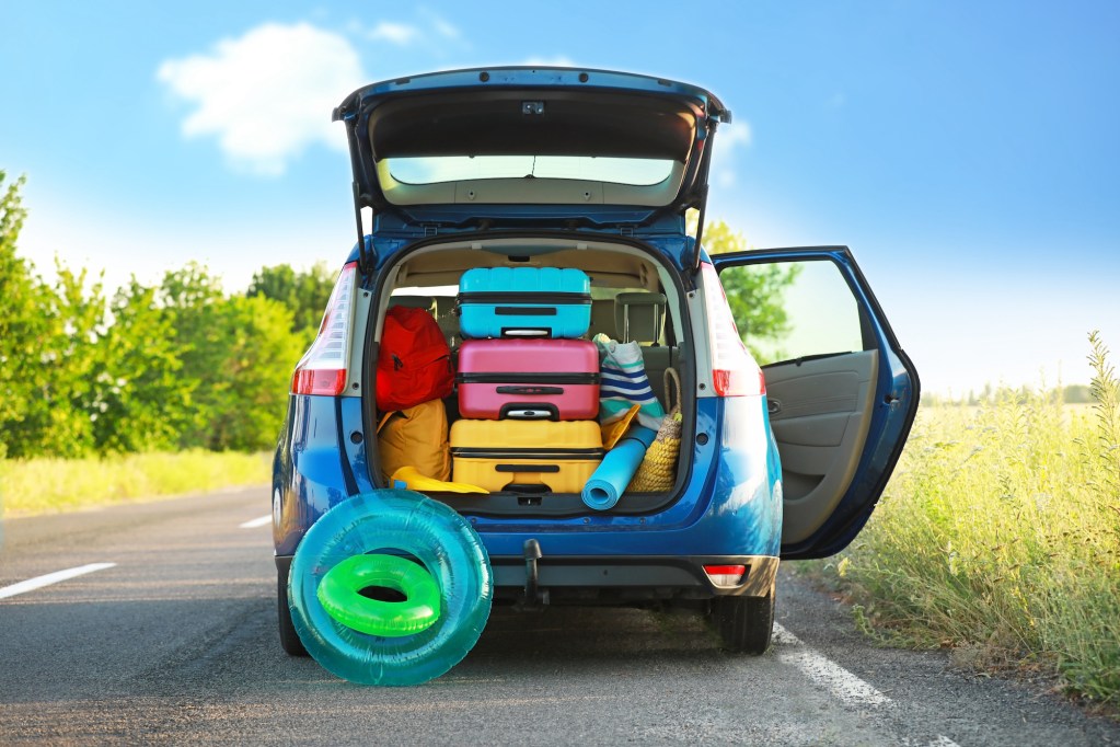 Modern car with luggage outdoors